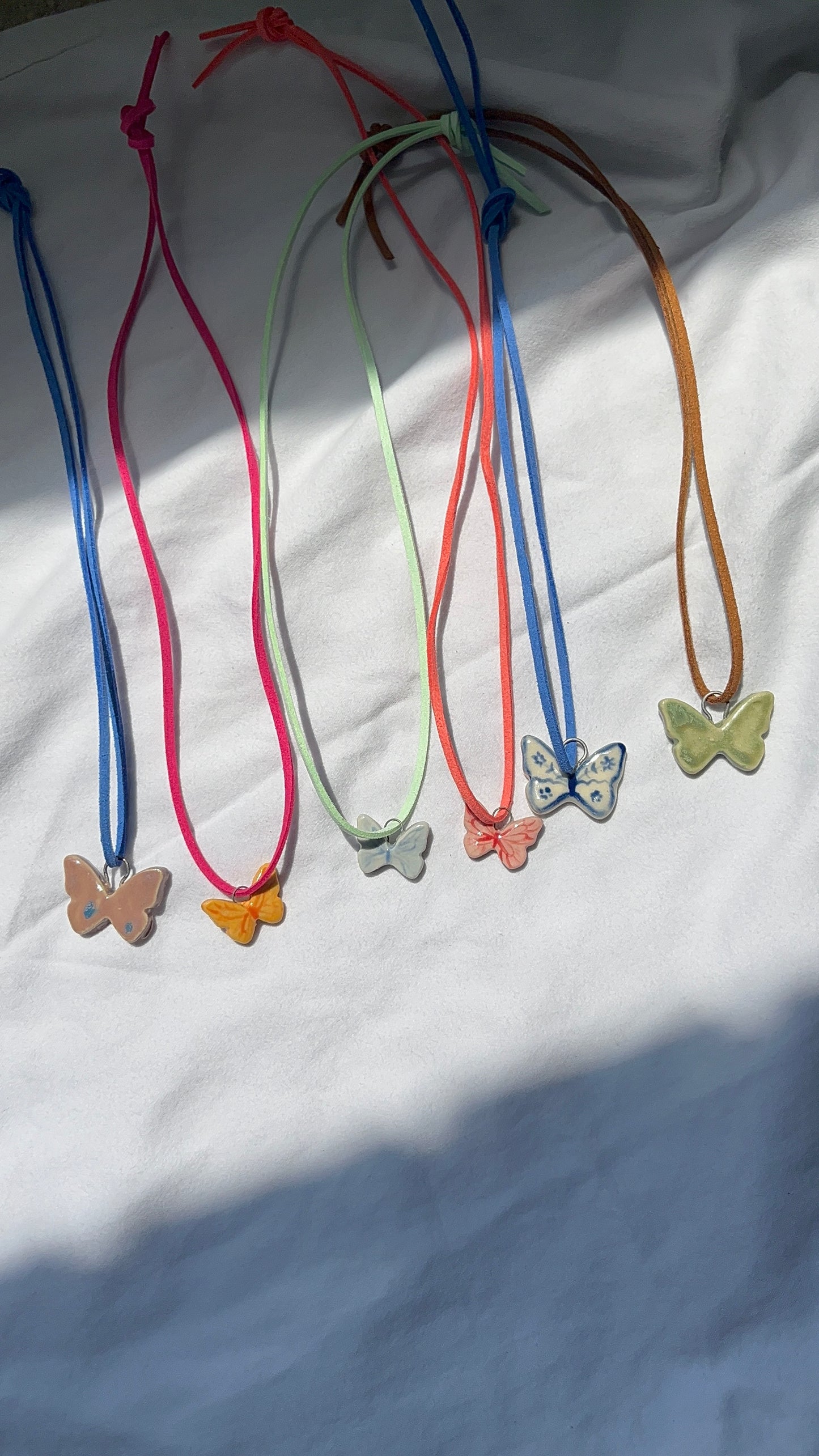 Blue butterfly necklace