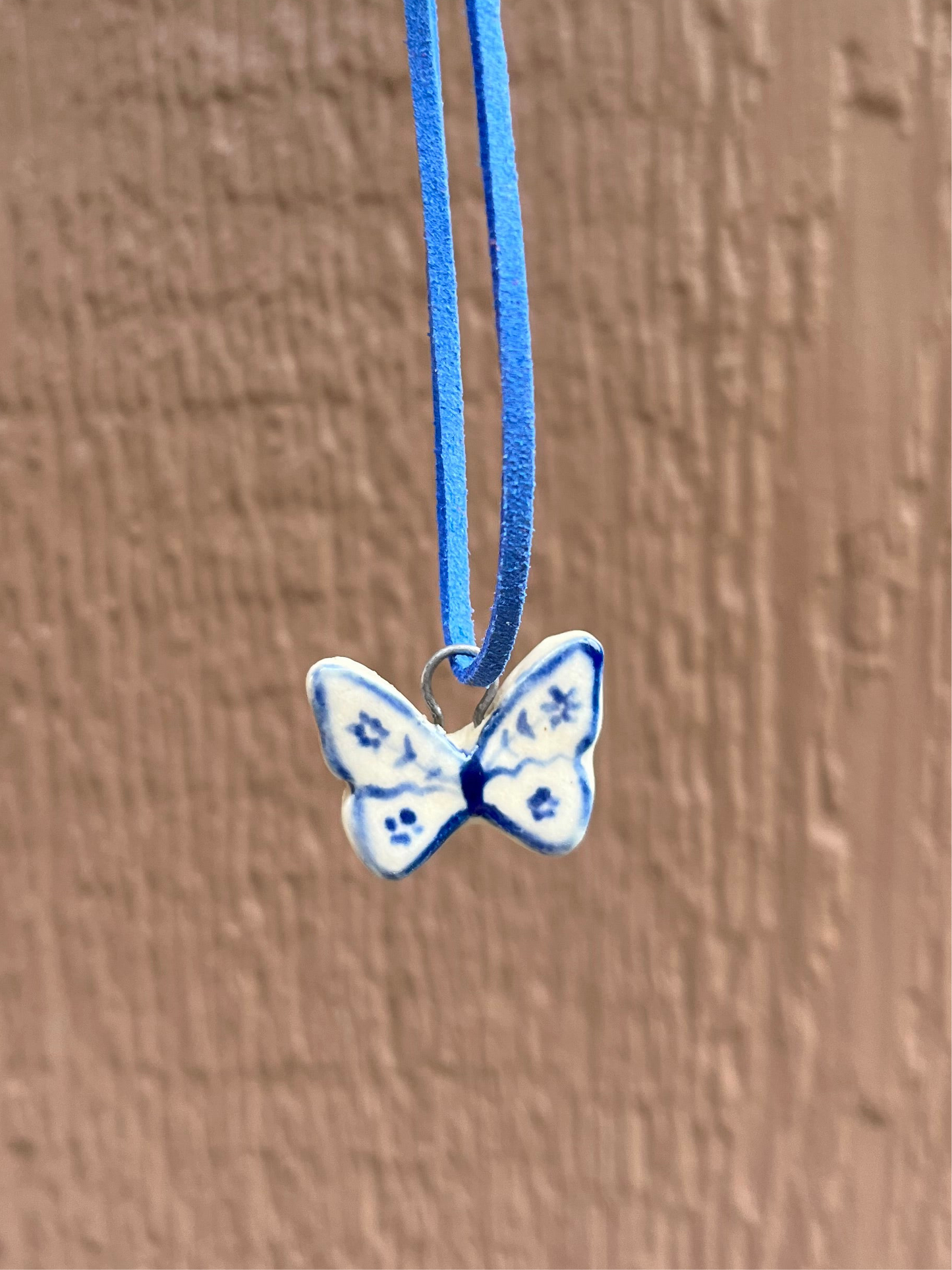 Blue butterfly necklace
